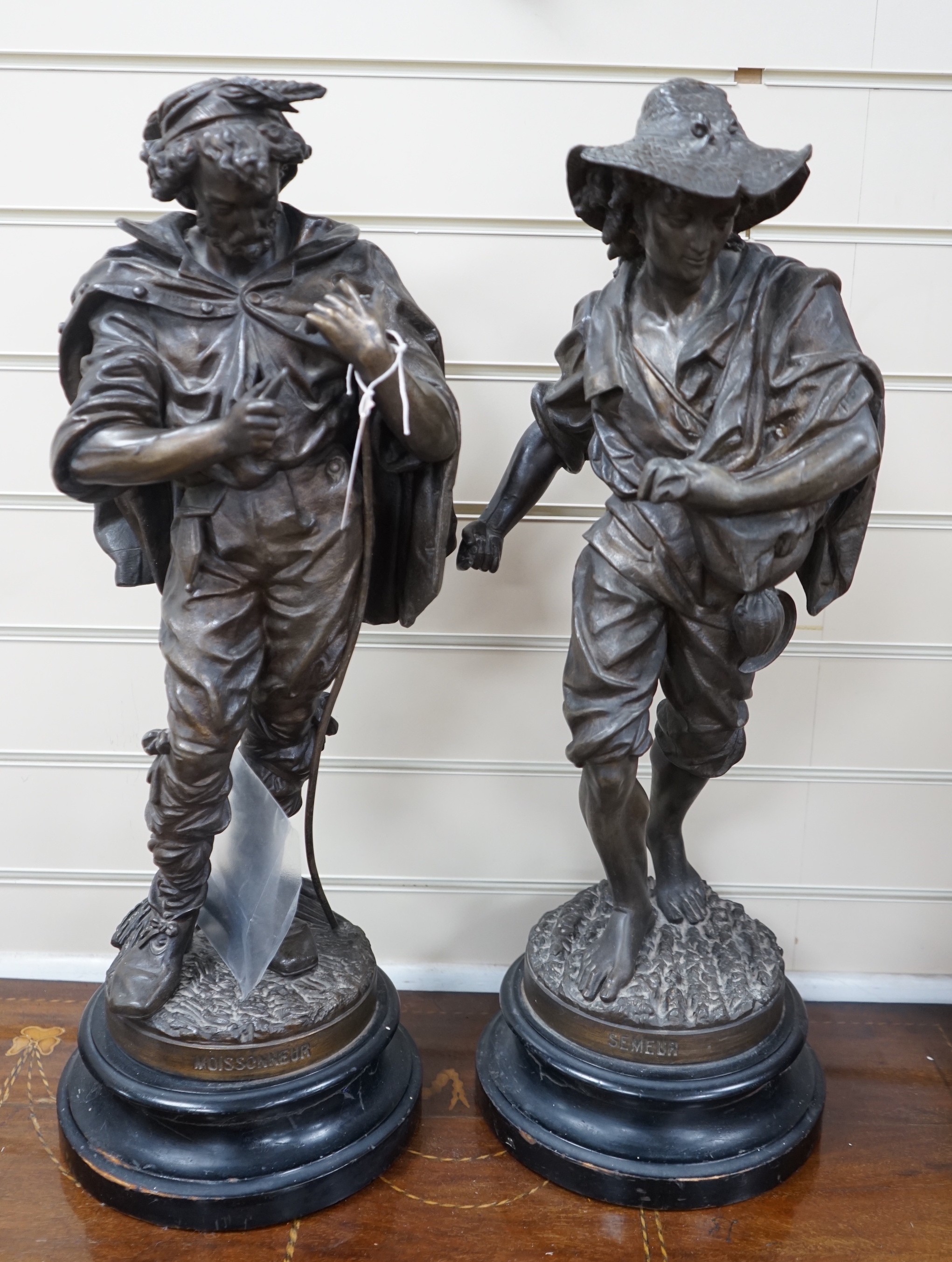 A pair of large early 20th century French spelter figures. 65cm tall